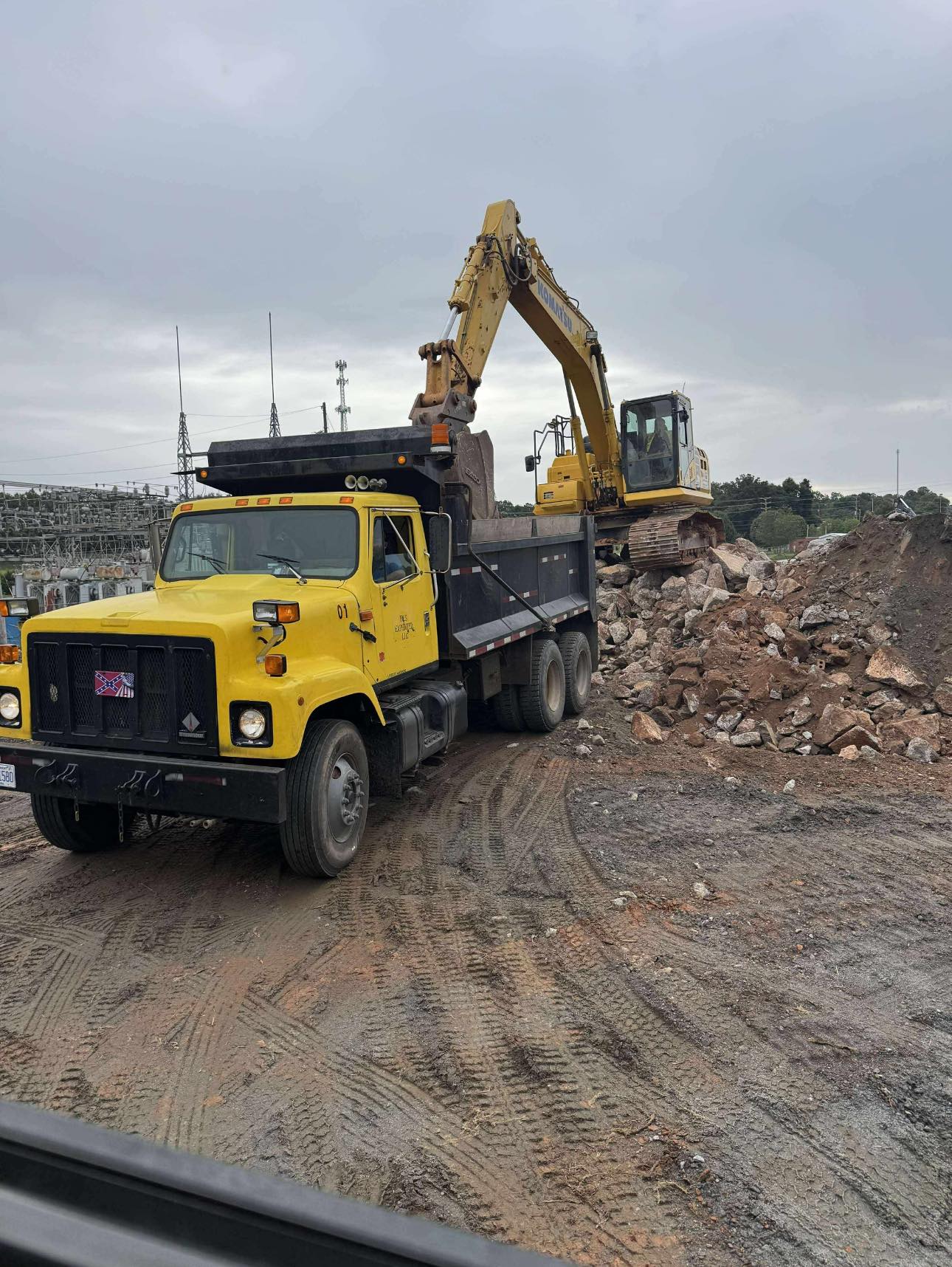 F&S Expedited LLC - excavator loading dump truck