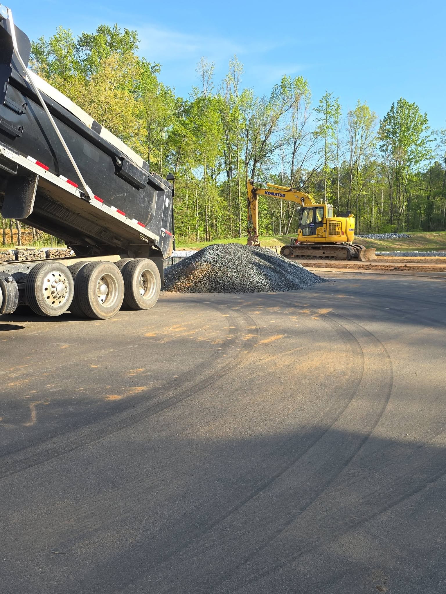 F&S Expedited LLC - gravel jobsite with excavator